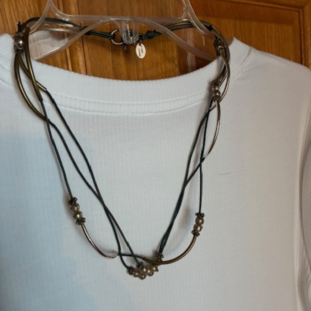 Lizzy James necklace / wrap bracelet. Leather and sterling silver.
